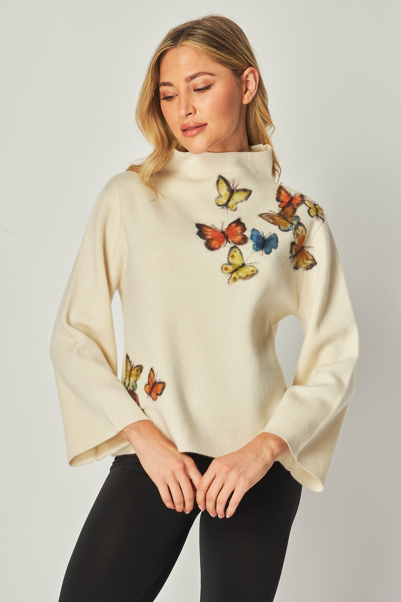 Mock Neck Sweaters with a flock of butterfly