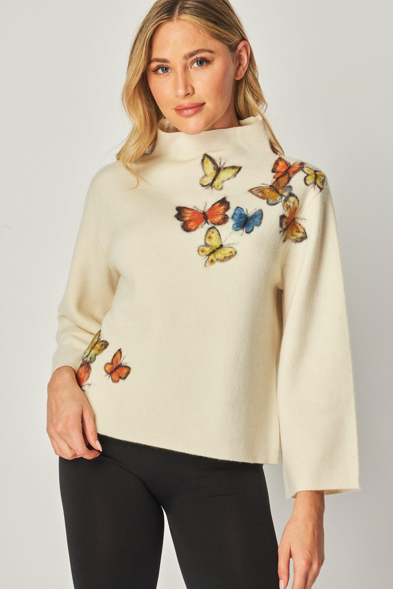 Mock Neck Sweaters with a flock of butterfly